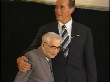 Nagaharu Yodogawa with Arnold Schwarzenegger
