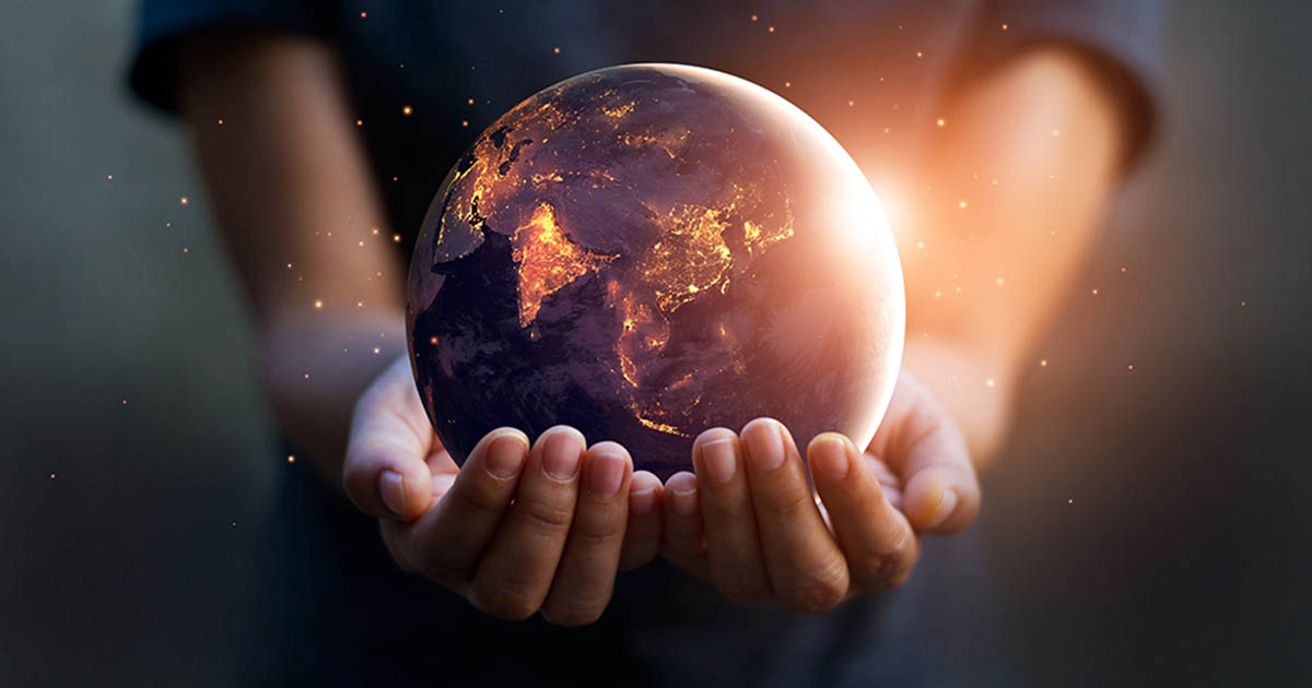 Earth at night was holding in human hands - Land Of The Rising Son