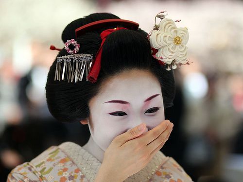 kimono clad girl covering mouth while laughing-01