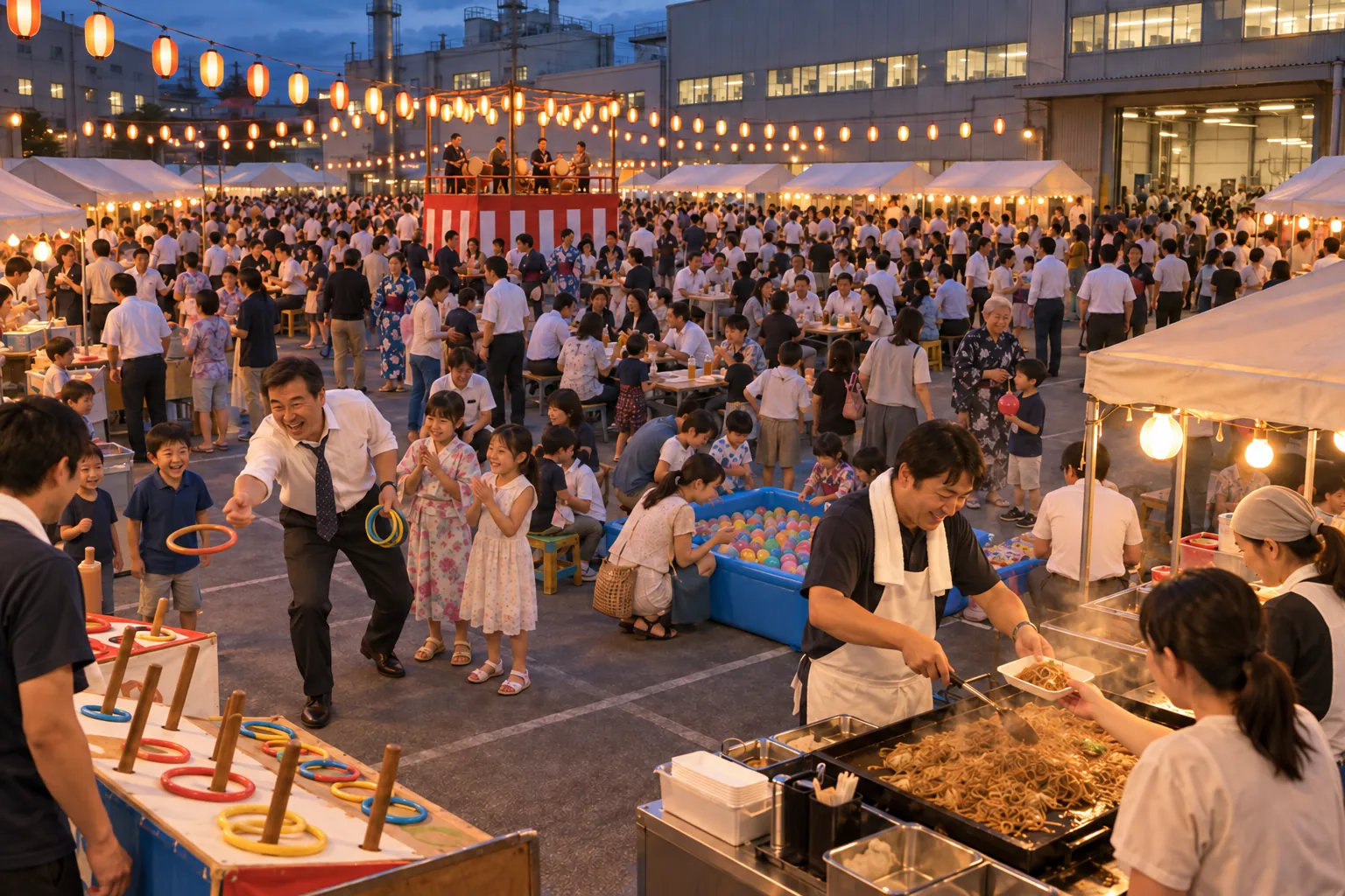 Hundreds of employees and families fill a lantern-lit company courtyard, where a laughing manager plays ring toss beside children, water-balloon games and steaming food stalls.